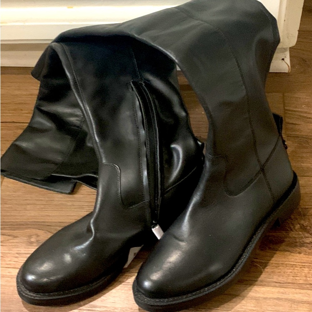 1” heel; never worn… slim fitting and zips from bottom, please see pictures.